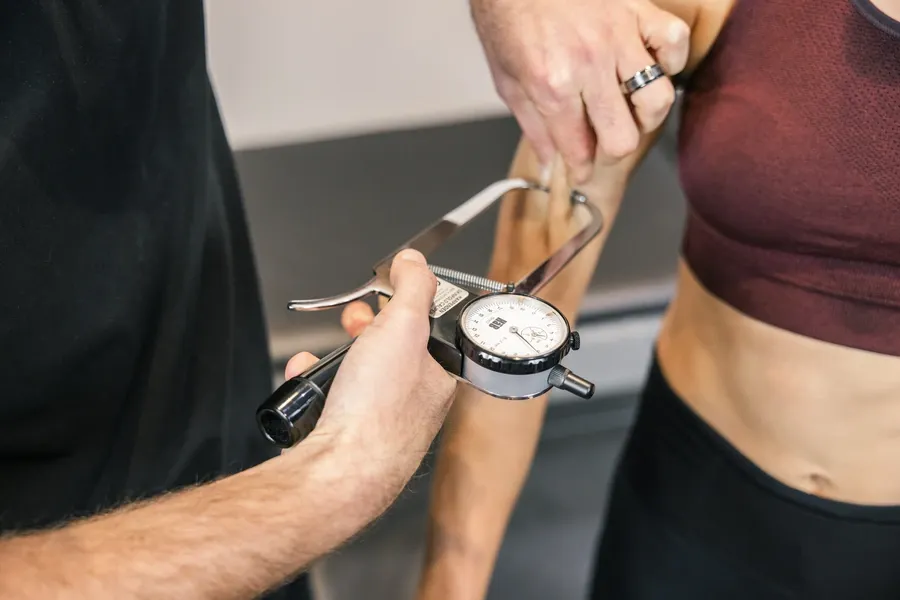 Sport Scientist measuring skinfolds for a Fax Max test